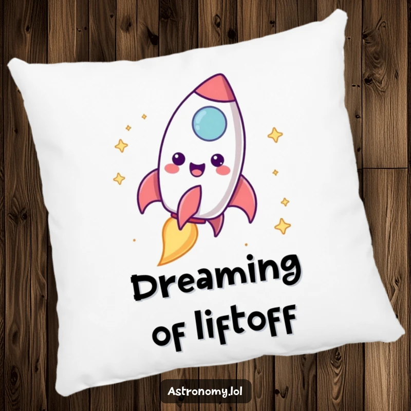 Funny rocket ship pillow featuring a happy character blasting off with a cheerful trail, designed for comfort and playfulness.