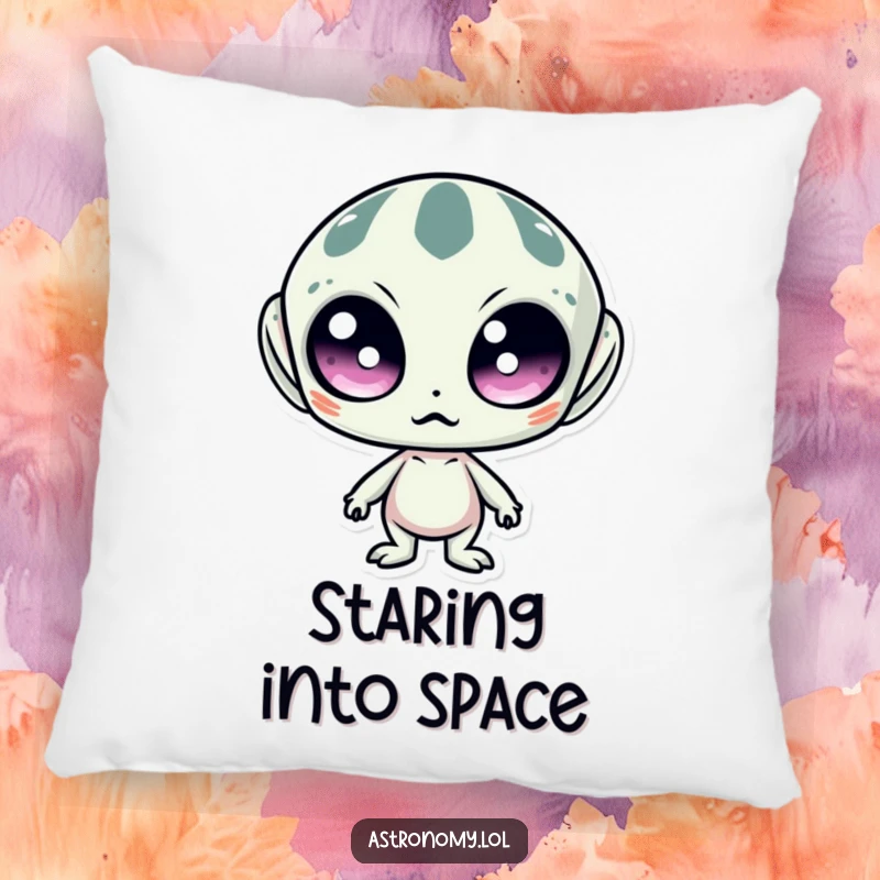 Funny pillow displaying a surprised alien with large, wide eyes, adding comfort and a touch of extraterrestrial amusement.