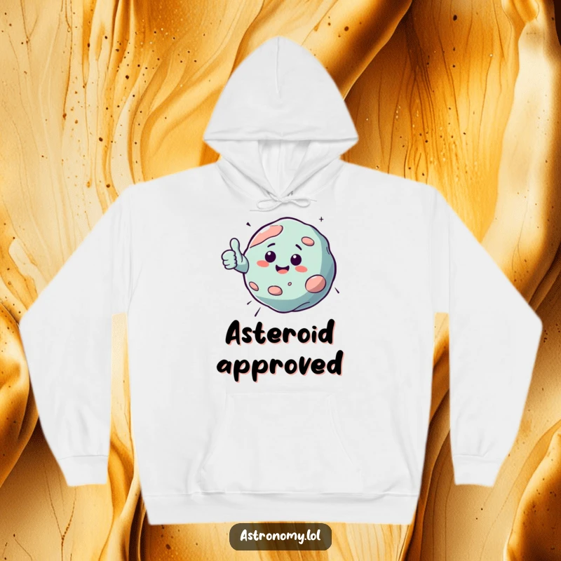 Funny hoodie featuring a bouncing asteroid character giving a cheerful thumbs up, designed for warmth and a touch of interstellar humor.
