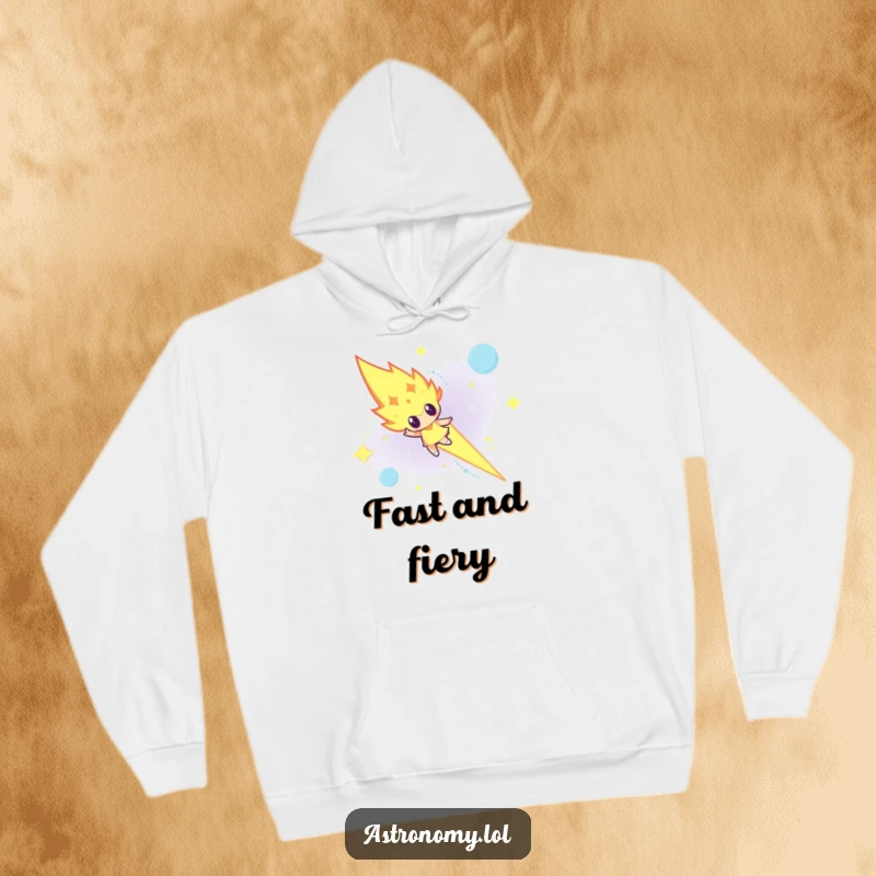 Funny determined meteor character blazing across a night sky on a cozy hoodie, radiating power.