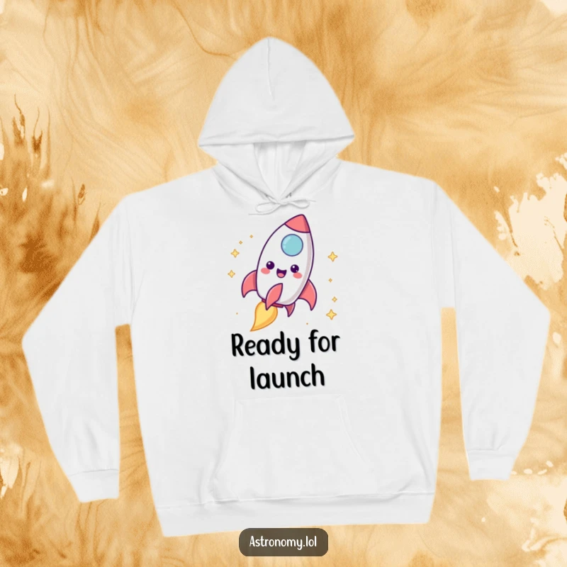 Funny rocket ship hoodie featuring a delighted character blasting off with a bright, cheerful trail, designed for warmth and fun.