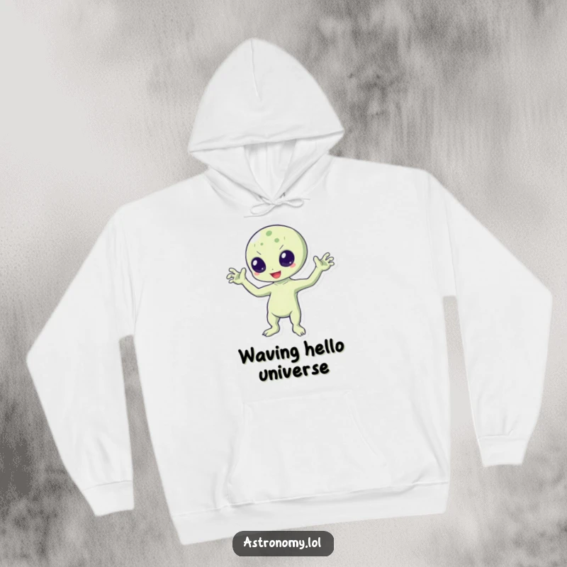 Funny hoodie featuring a cheerful, bouncing alien character happily waving with all three arms, radiating warmth and extraterrestrial charm.