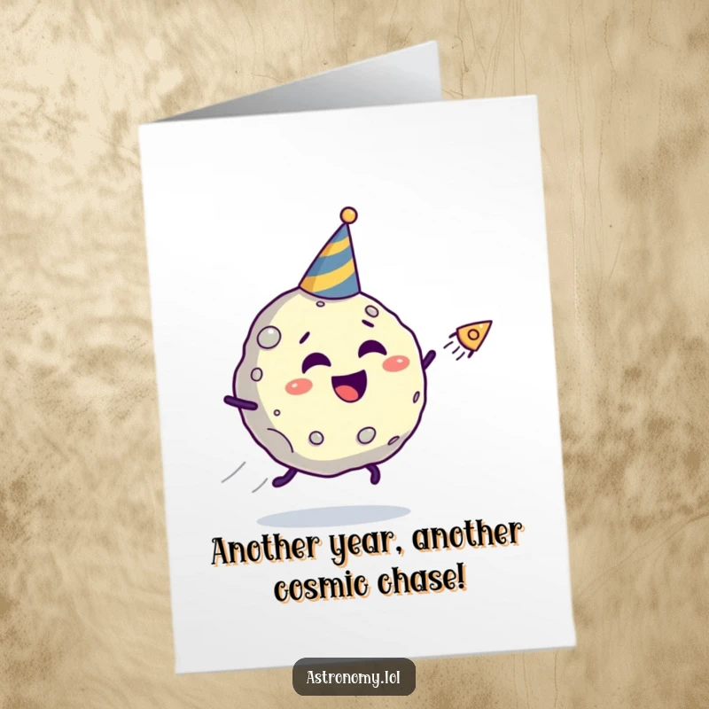 Funny Free Printable Birthday Card: Giggling asteroid in a party hat speeds away from a chasing comet.