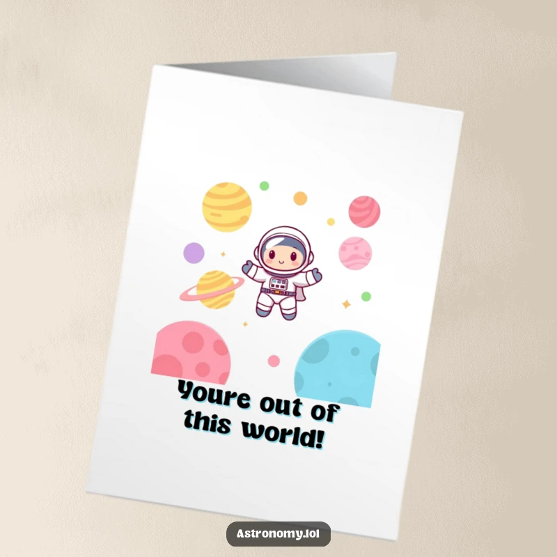 Funny Free Printable Birthday Card: Cute astronaut joyfully floating among vibrant, colorful planets for a memorable DIY gift.