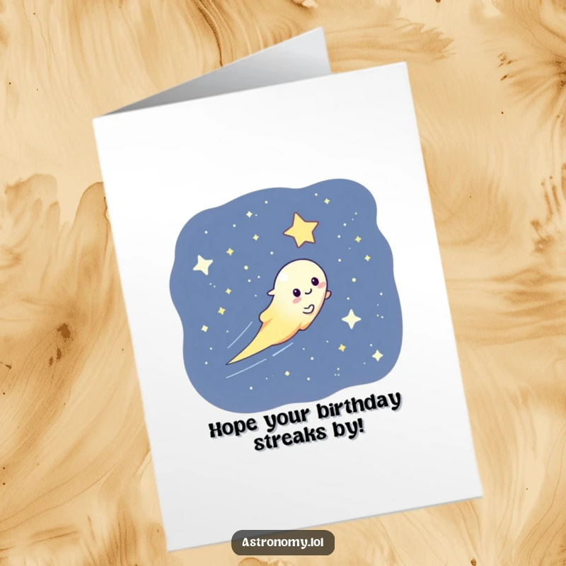 Funny Free Printable Birthday Card: A cheerful comet with a playful grin streaking fast across a dark, starry sky.
