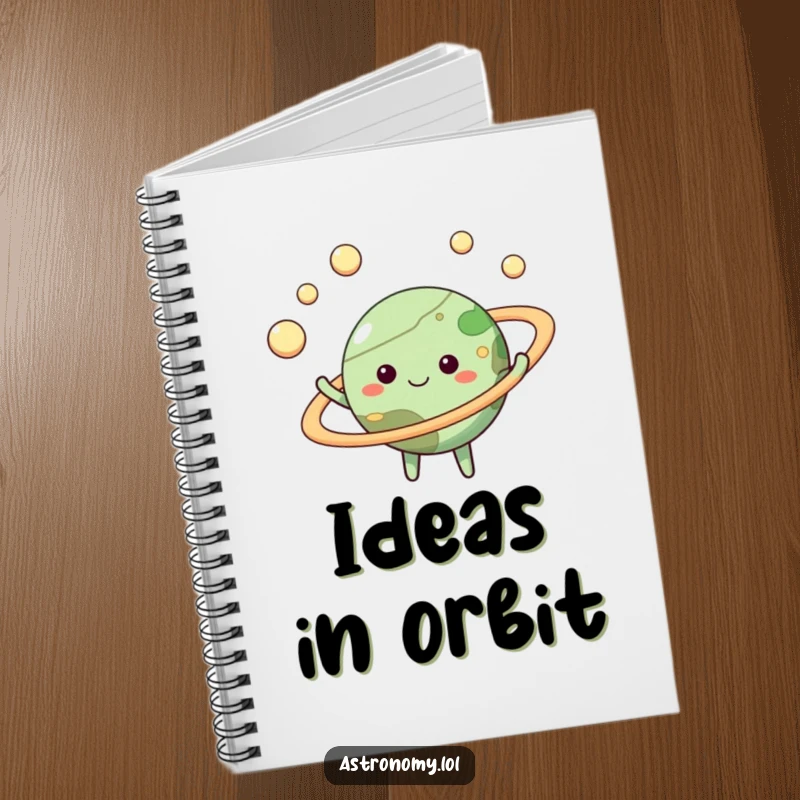 Funny planet notebook with a happy face juggling moons, perfect for jotting down ideas with a touch of celestial charm.