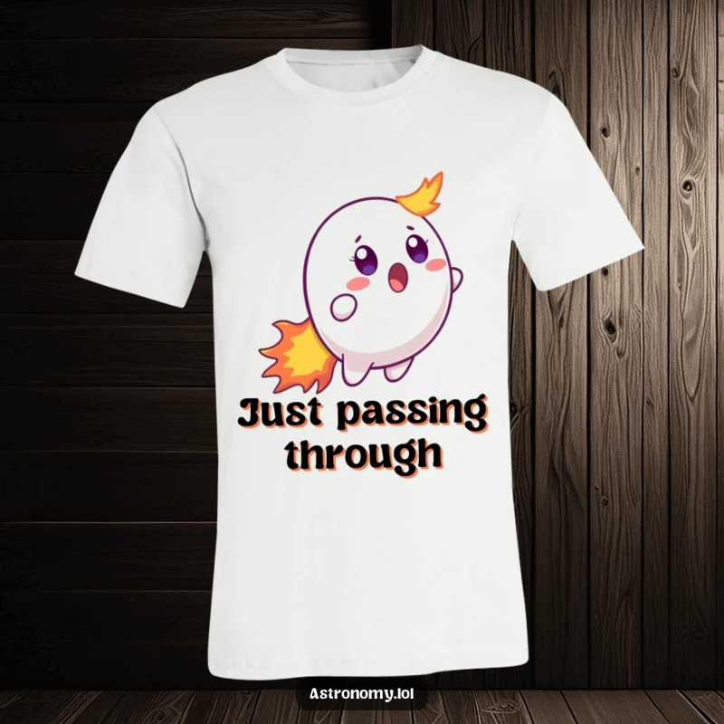 Funny t-shirt showcasing a comically surprised comet character with a flaming tail, expressing shock in the vastness of outer space.