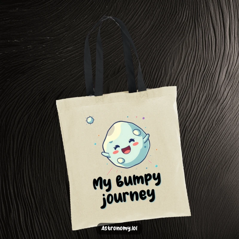 Funny Asteroid Tote Bag with a joyful, tumbling character, perfect for carrying essentials with a carefree, cosmic vibe.