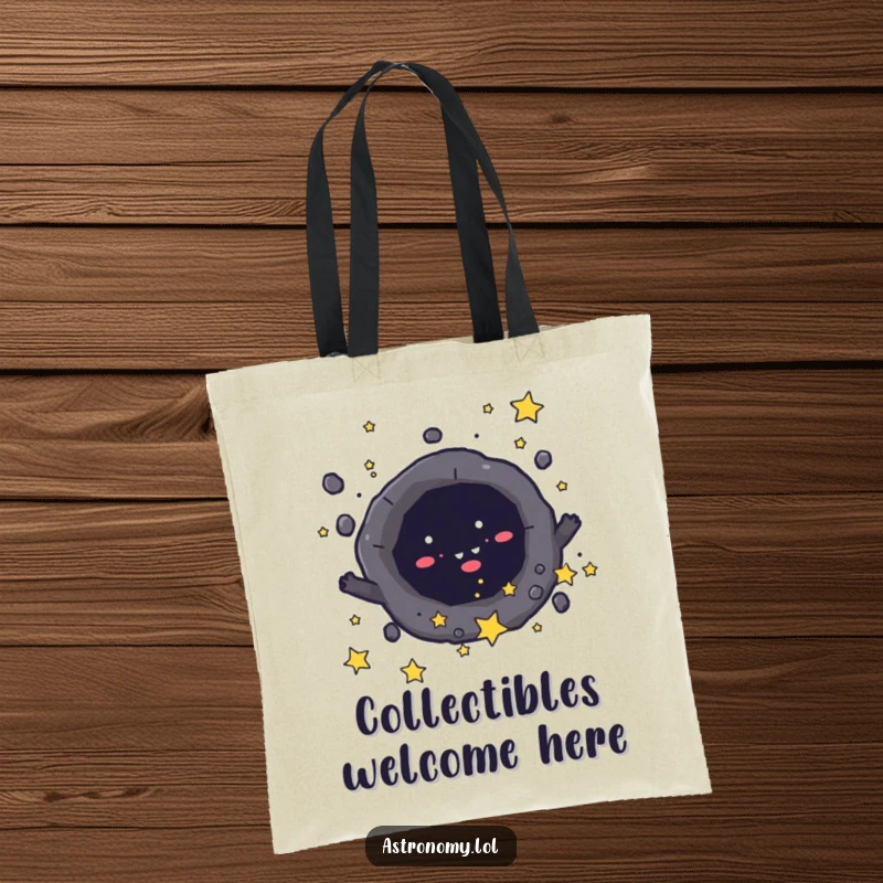 Funny tote bag featuring a mischievous black hole character playfully collecting small stars, perfect for carrying treasures. Practical gift.