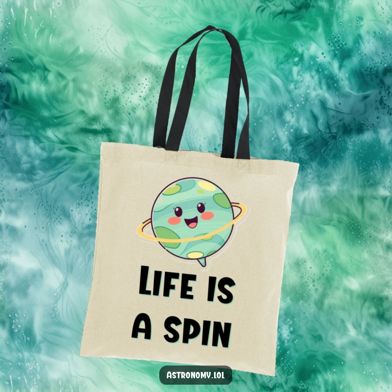 Funny tote bag with an image of a cheerful planet character spinning joyfully, perfect for carrying items with a playful, cosmic theme.